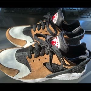 Brown, white, and black Nike huaraches. worn twice, no creases brand new